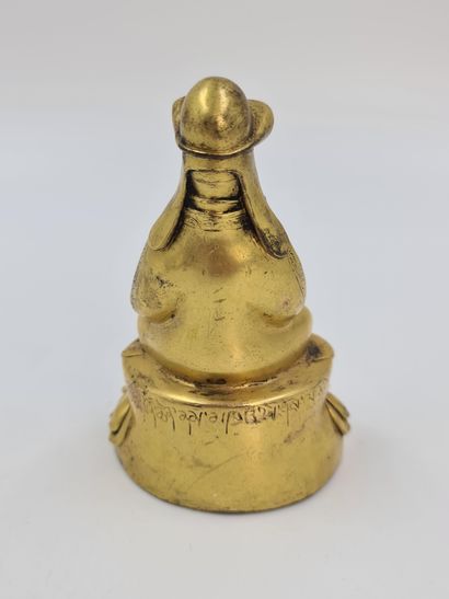 null 
Lama de la secte des bonnets jaunes. Bronze doré. Tibet XIXème siècle. Ht :...