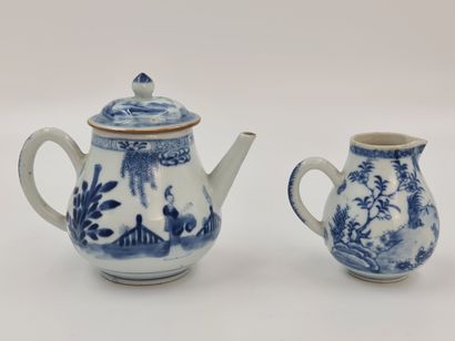 null China porcelain teapot with white/blue decoration of a scene animated with characters....