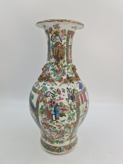 null Porcelain vase of Canton end of XIXth century. Decorated with characters. Handles...