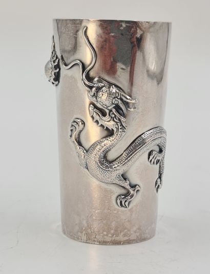 null Chinese silverware cup. Decoration of dragon chasing the sacred pearl. Chinese...