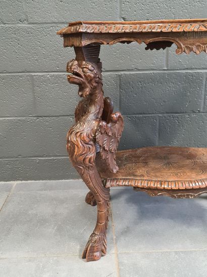 null Tea table in carved walnut decorated with chimeras. Removable tray. Table top...