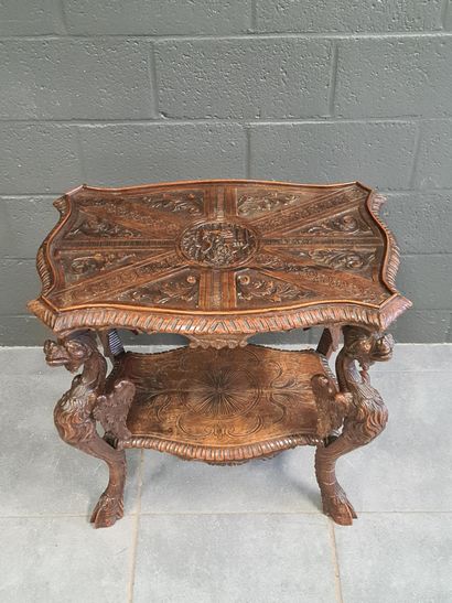 null Tea table in carved walnut decorated with chimeras. Removable tray. Table top...