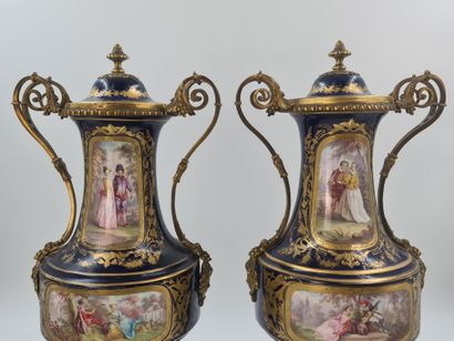null Pair of late 19th century porcelain vases in the Sevres taste with romantic...