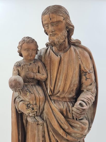 null 圣约瑟夫和婴儿耶稣。1800年左右的木雕（树枝已丢失）。高度：74厘米。

Sint-Jozef en het kind Jezus.1800年以后的Houtsnijwerk（Mist...