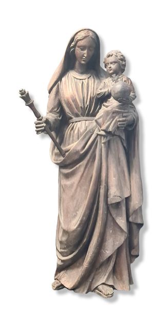 Vierge à l’ enfant en bois sculpté vers 1700....