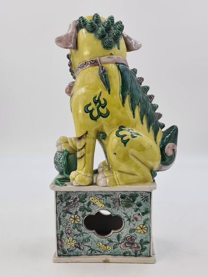 null Large subject in cookie and enamels of the green family representing a Dog of...