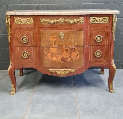 null Chest of drawers of transitional style richly decorated with bronzes, opening...