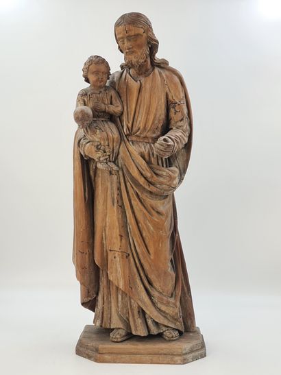 Saint Joseph et l’enfant Jésus. Bois sculpté...