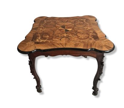 null Regency period table with worked legs and marquetry top. Cork ? Shelf to be...