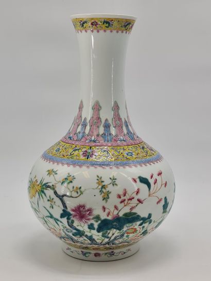 null China 20th century. Large bottle vase with a long neck on a foot in porcelain...