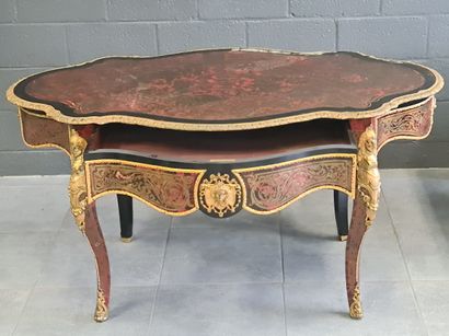 null Regency style table in Boulle marquetry opening with a drawer on the front....