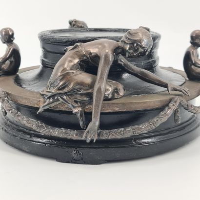 null Art Nouveau base in blackened wood decorated with women and children supporting...