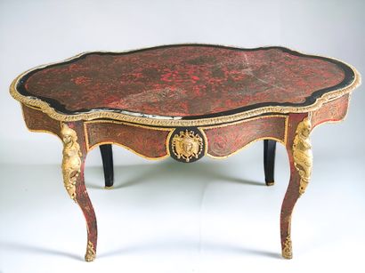null Regency style table in Boulle marquetry opening with a drawer on the front....