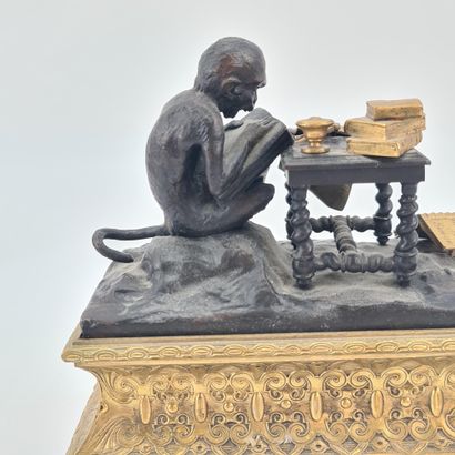 null Inkwell in gilded and patinated bronze with a humorous subject of a learned...
