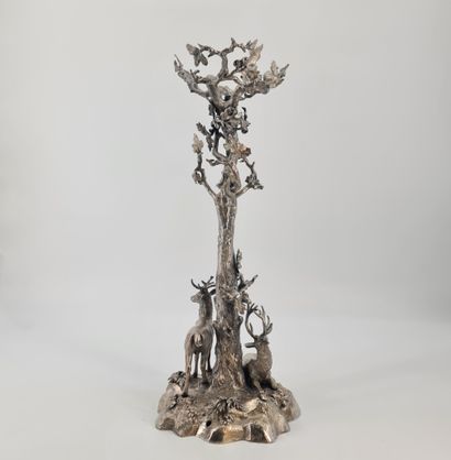 null Silvered bronze centerpiece decorated with deer. Height: 58 cm.