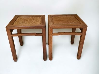 null China, 19th century. Pair of square stools with donkey-back crosspieces, in...