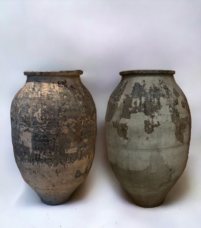null South China, 19th century. Set of two beige terra cotta jars, formerly glazed....