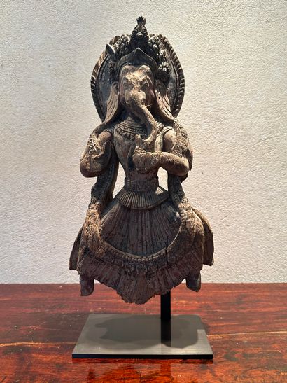 null Nepal, 17th century. Carved wood representing the four-armed god "Ganesh", dressed...