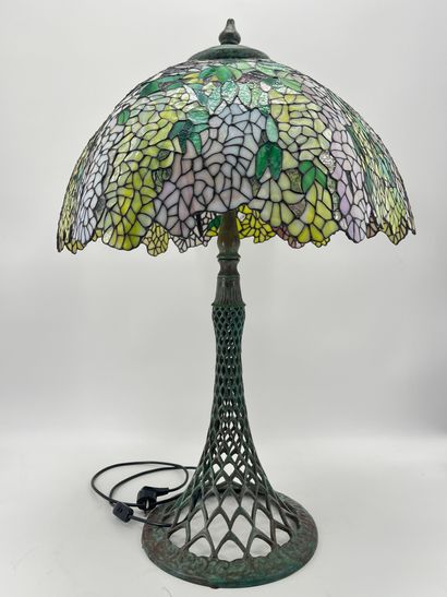 null Tiffany-style mushroom lamp. Beautiful bronze base with green patina. Height:...