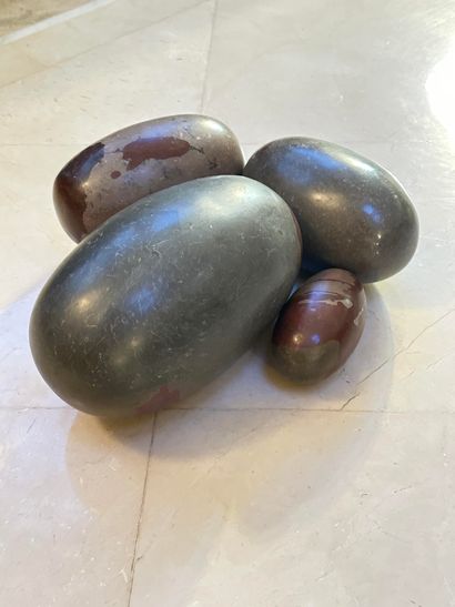 null India. Set of 4 stone shiva lingams. N.B. Shiva lingams are intended to protect...