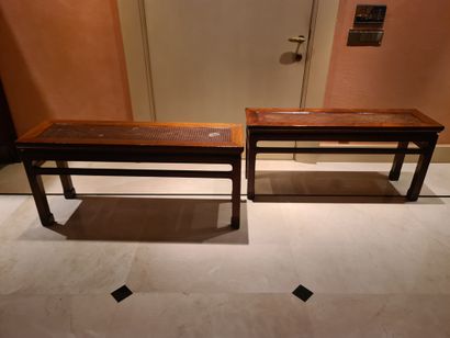 null China, circa 1900. Pair of rectangular benches in light wood, topped with a...