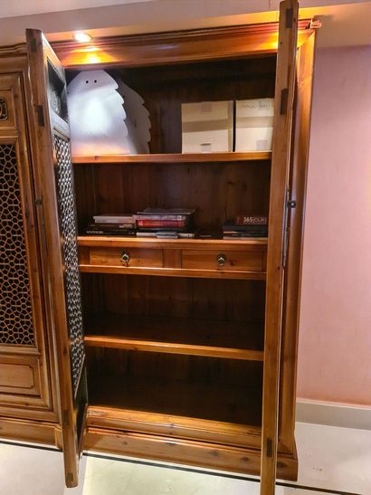 null China, circa 1900. Important light wood bookcase composed of three two-door...