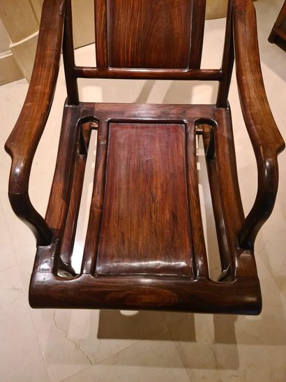 null China, 19th century. Wooden armchair with long arms and elongated back. Height...