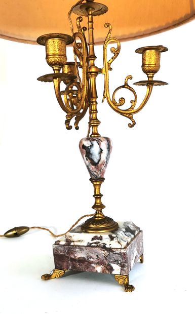 null Pair of four-light candelabra in chased gilt bronze, the shaft decorated with...