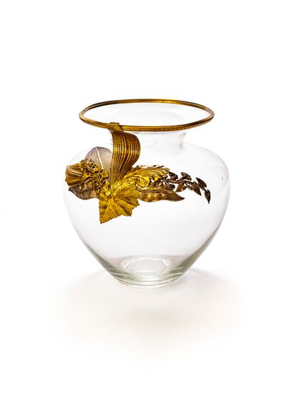 null Large glass vase with flared neck rimmed with gold metal, the upper part of...
