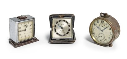null Set of eight alarm clocks:

- Art Deco quadrangular alarm clock in chromed metal,...