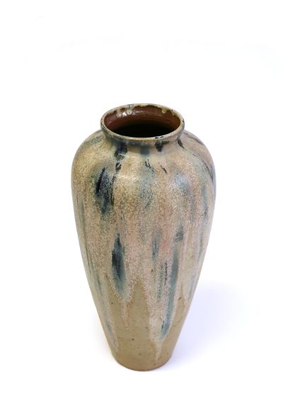 null C. GUBER (Active in the 20th century)

High shoulder earthenware vase with blue-pink...