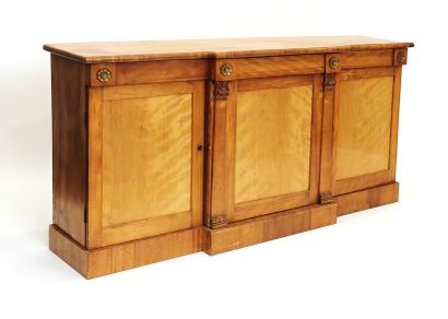 null Lemon tree veneer sideboard with a central opening, resting on a skirting board,...