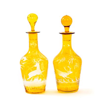 null Two carafons with their stoppers in Bohemian crystal in yellow shades that can...