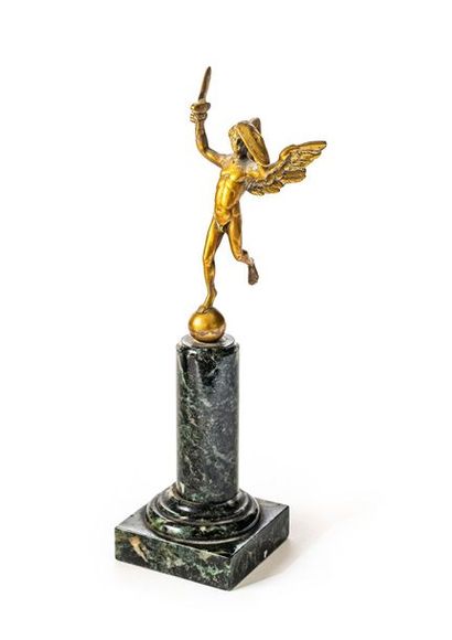 null Saint-Michel Victorieux
Statuette in gilt bronze perched on a sea-green marble...