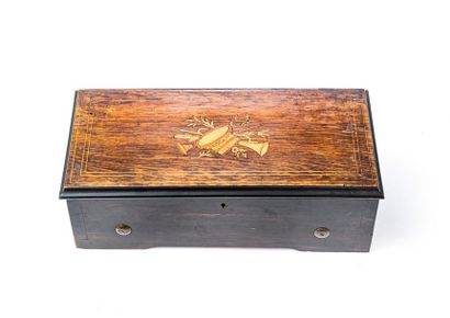 null 19th century roll music box
The veneer and stained wood box with inlaid decoration...