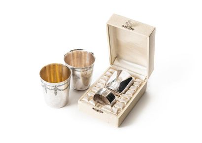 null Baptism cup and its napkin ring in nickel silver with engraved decoration of...