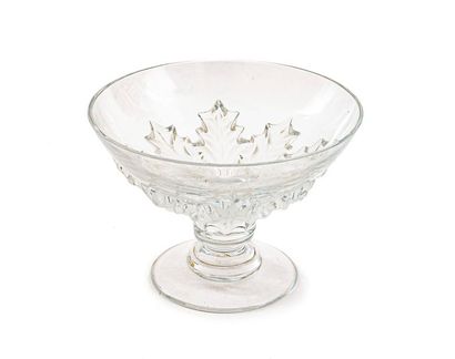 null LALIC
Cup on pedestal in moulded pressed glass with rotating decoration of thistles...
