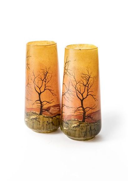 null Maison LEGRAS, circa 1910
Pair of slightly tapered enamelled glass vases decorated...