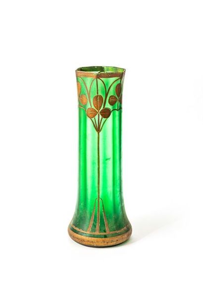 null High vase in green tinted glass with painted decoration of arcatures and clovers
Early...