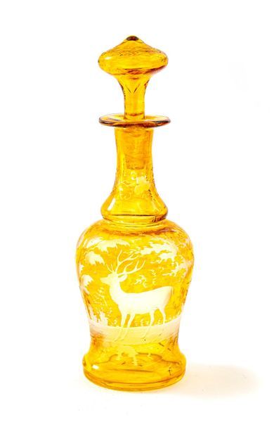 null Bohemian crystal decanter with stopper in yellow shades
Decoration engraved...