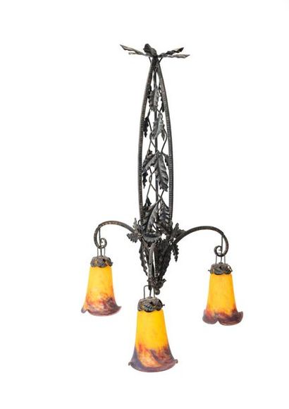 null Wrought-iron suspension with three lights, the shaft with foliated decoration...