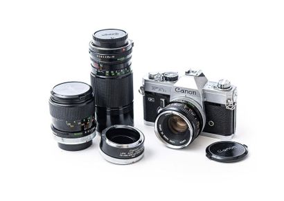 null CANON FTb SLR camera with three CANON lenses (50 mm 1:1.8 / 50 mm 1:3.5 / 70-150...