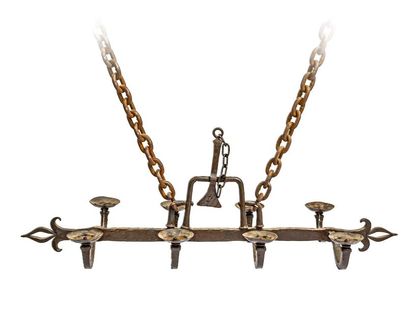 null Eight-light wrought-iron suspension; the arms supporting circular basins connected...