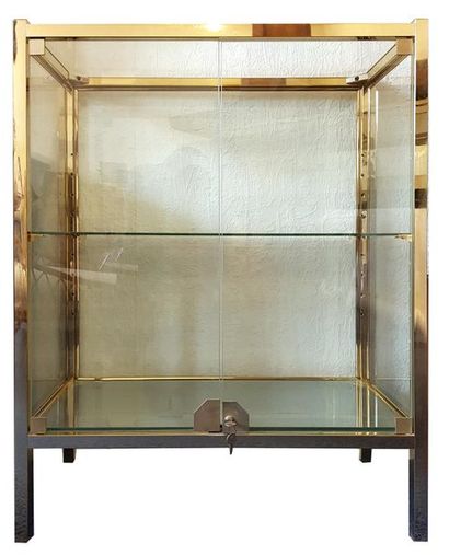 null Glass, brass and gilded metal display case with two doors
ca. 1960
77 x 37 x...