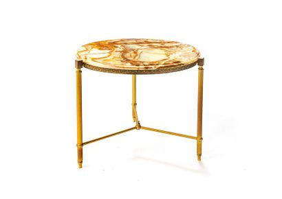 null Pedestal table with tripod base in bronze, the belt with shell-stamped brass...