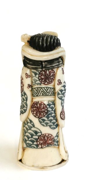 null *Japan, 1920

Carved polychrome ivory okimono featuring a stringed instrument...
