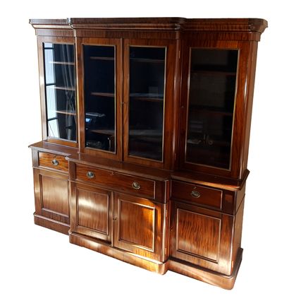 null Mahogany and mahogany veneer scriban bookcase with central projection opening...