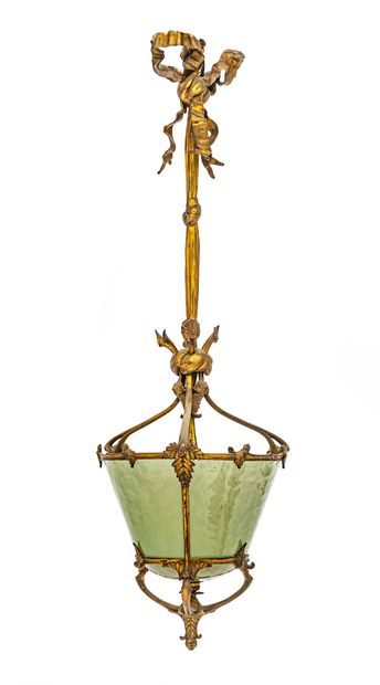 null *Gilt bronze suspension with drawn glass in the form of a wide ribbon supporting...