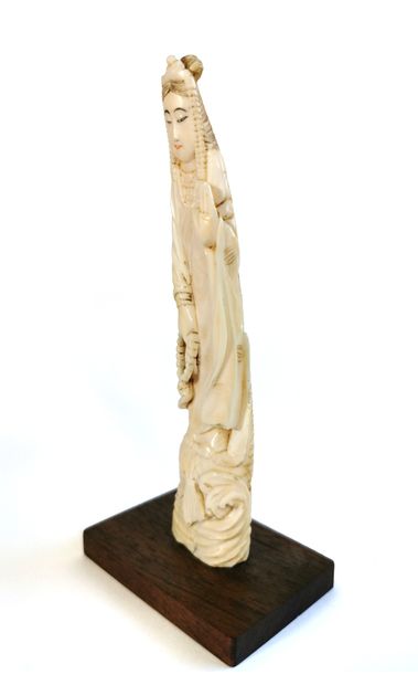 null *Japan, 1920

Carved polychrome ivory okimono with a carved goddess, possibly...
