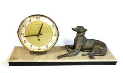 null Greyhound mantelpiece clock with silver patina, marble and onyx

The clock with...